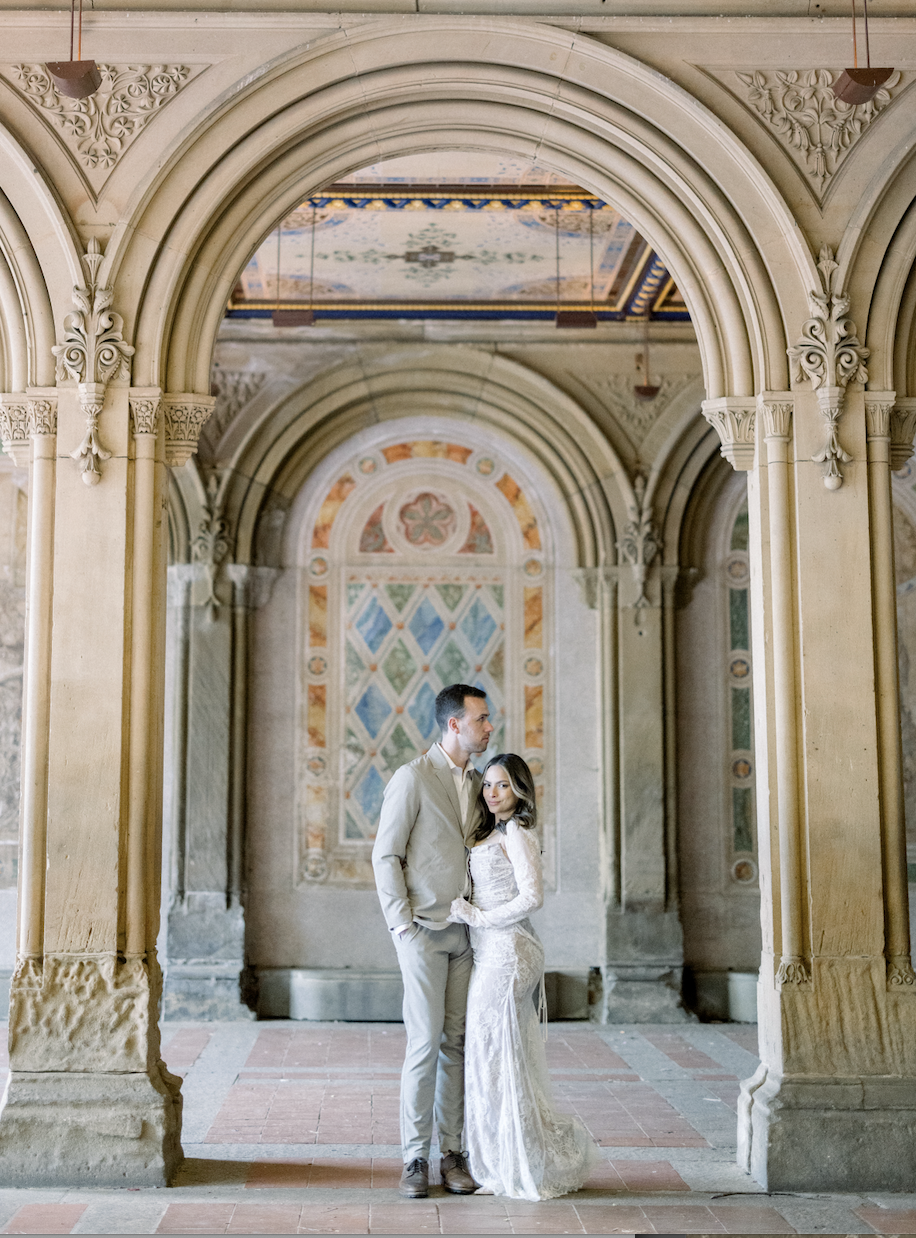 bride and groom pose in central park nyc
